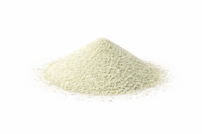 Pile of light green powder on a white background